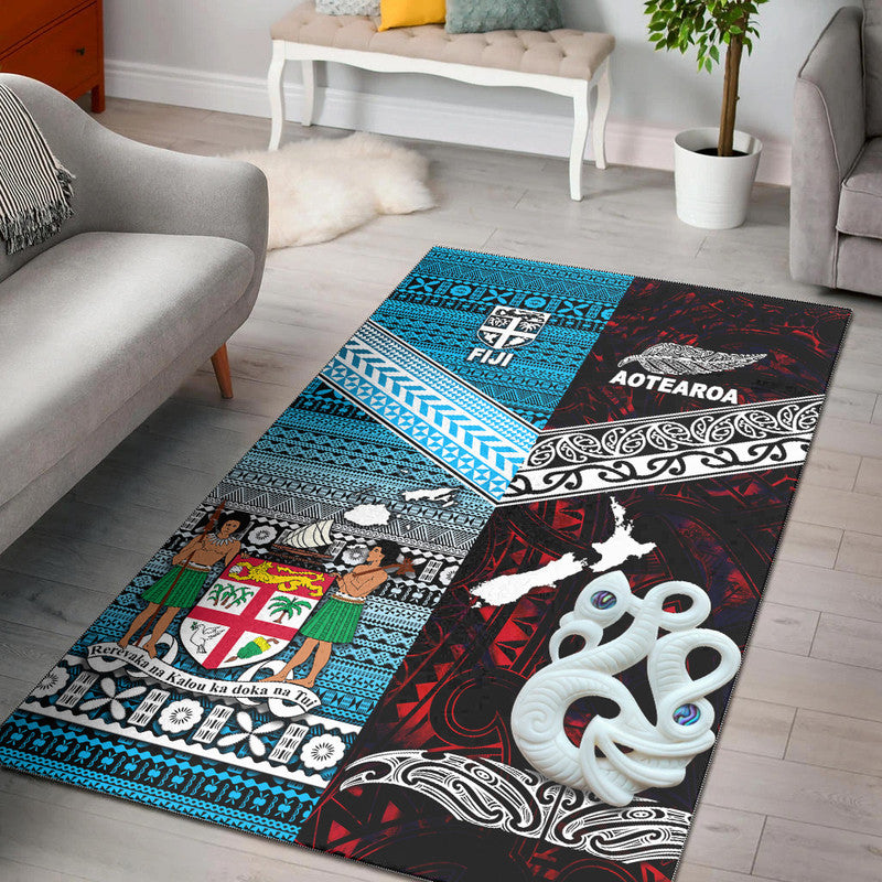 Red and blue area rug with tribal patterns, white octopus motif, and AOTEAROA text