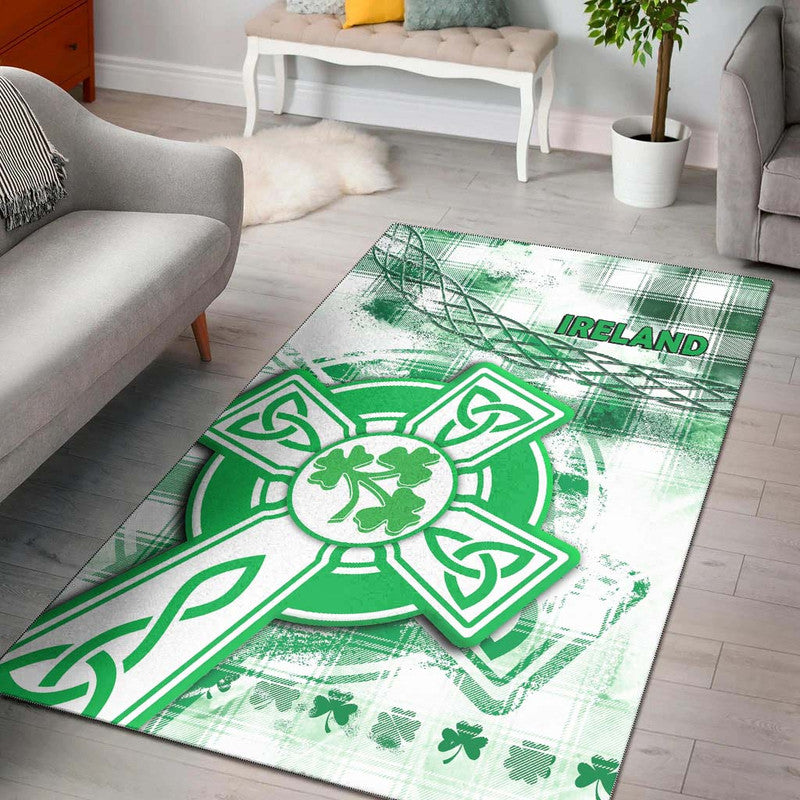 Green area rug with Celtic cross, shamrocks, plaid and 'IRELAND' text