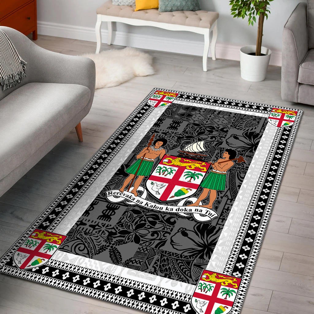 Fiji area rug with dark charcoal base, white border and decorative patterned frame