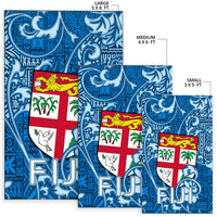 Fiji blue tapa rugs shown in 5x8, 4x6, and 3x5 sizes with FIJI text and flag cross.