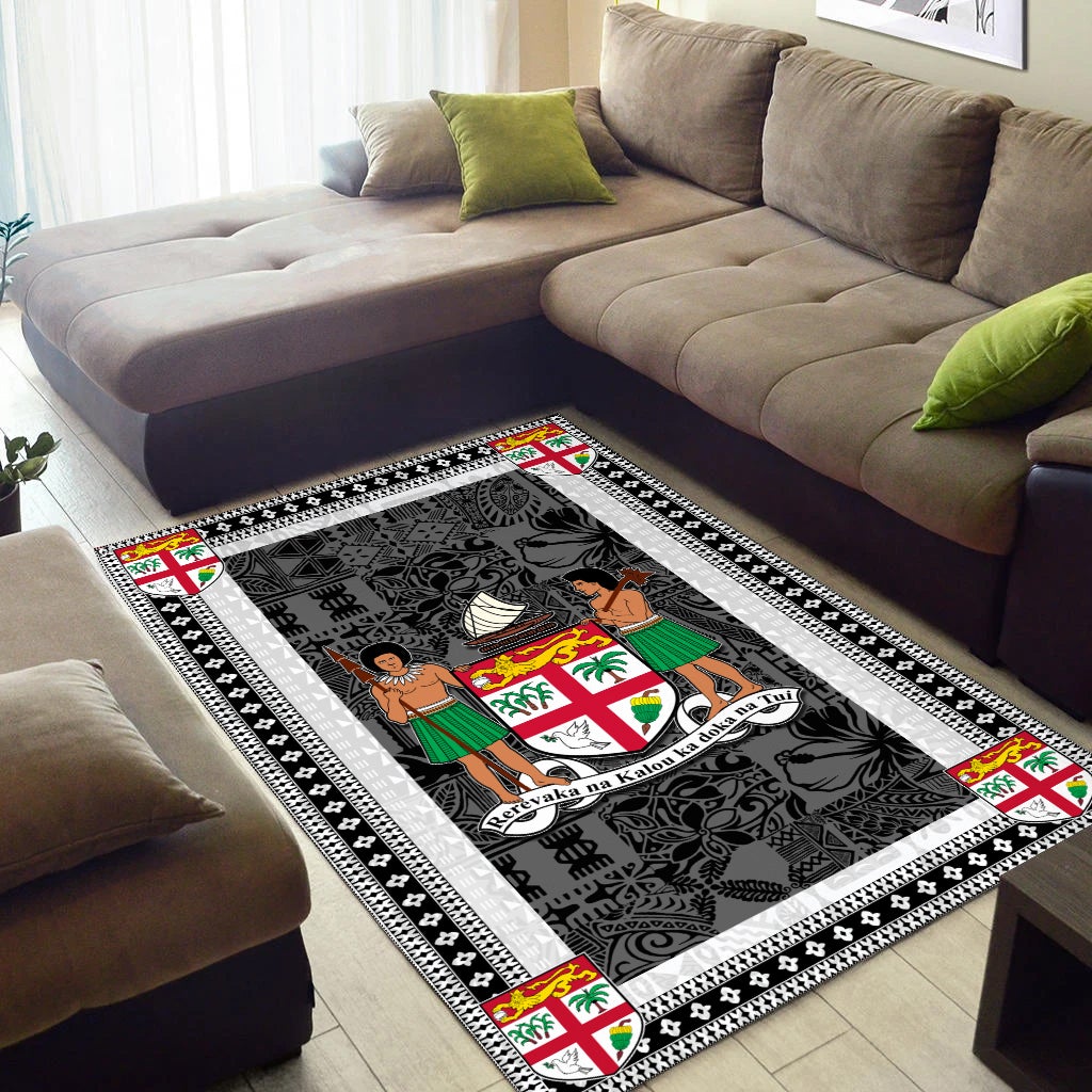 Fiji area rug in living room, dark charcoal pattern with white striped border