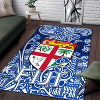 Blue Tapa-style area rug with Fiji flag center and decorative swirl border