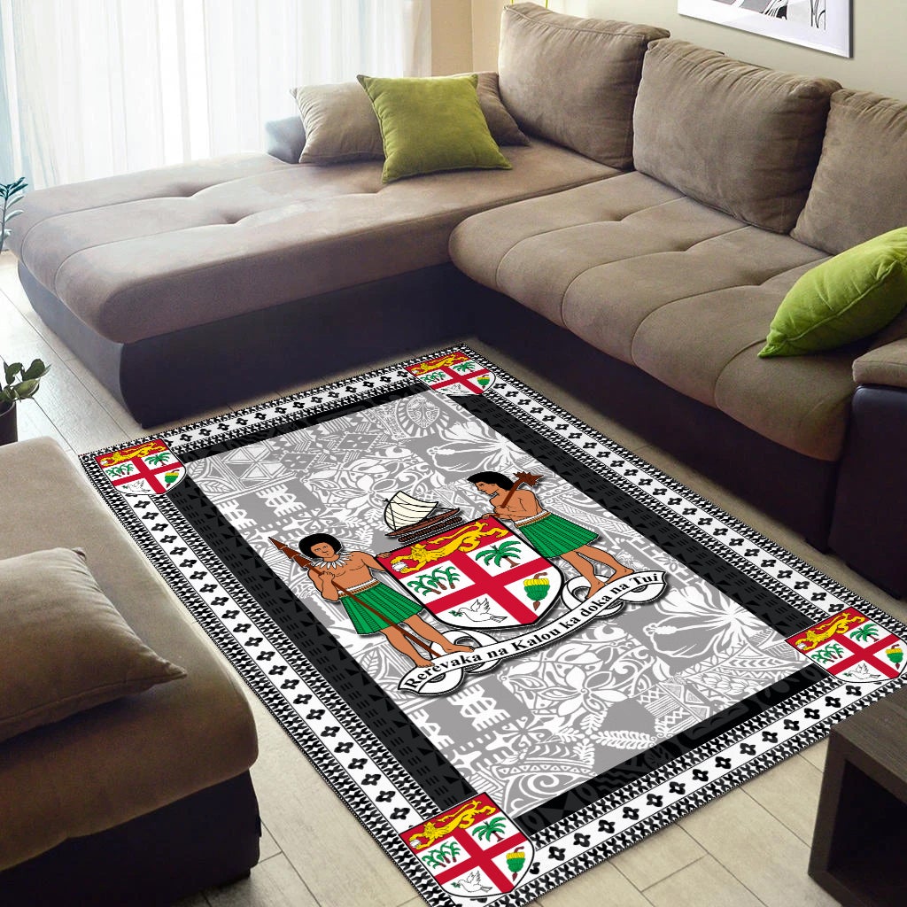 Black and white area rug with colorful crest squares and a large central graphic