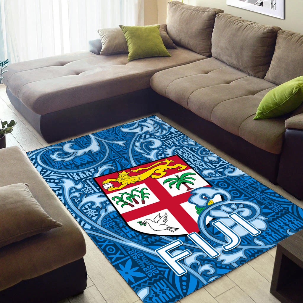 Blue Fiji area rug with tapa pattern border and big FIJI letters over a Fiji flag design.