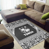 Black and white Tonga rug with large central crest, leaf and star-like geometry