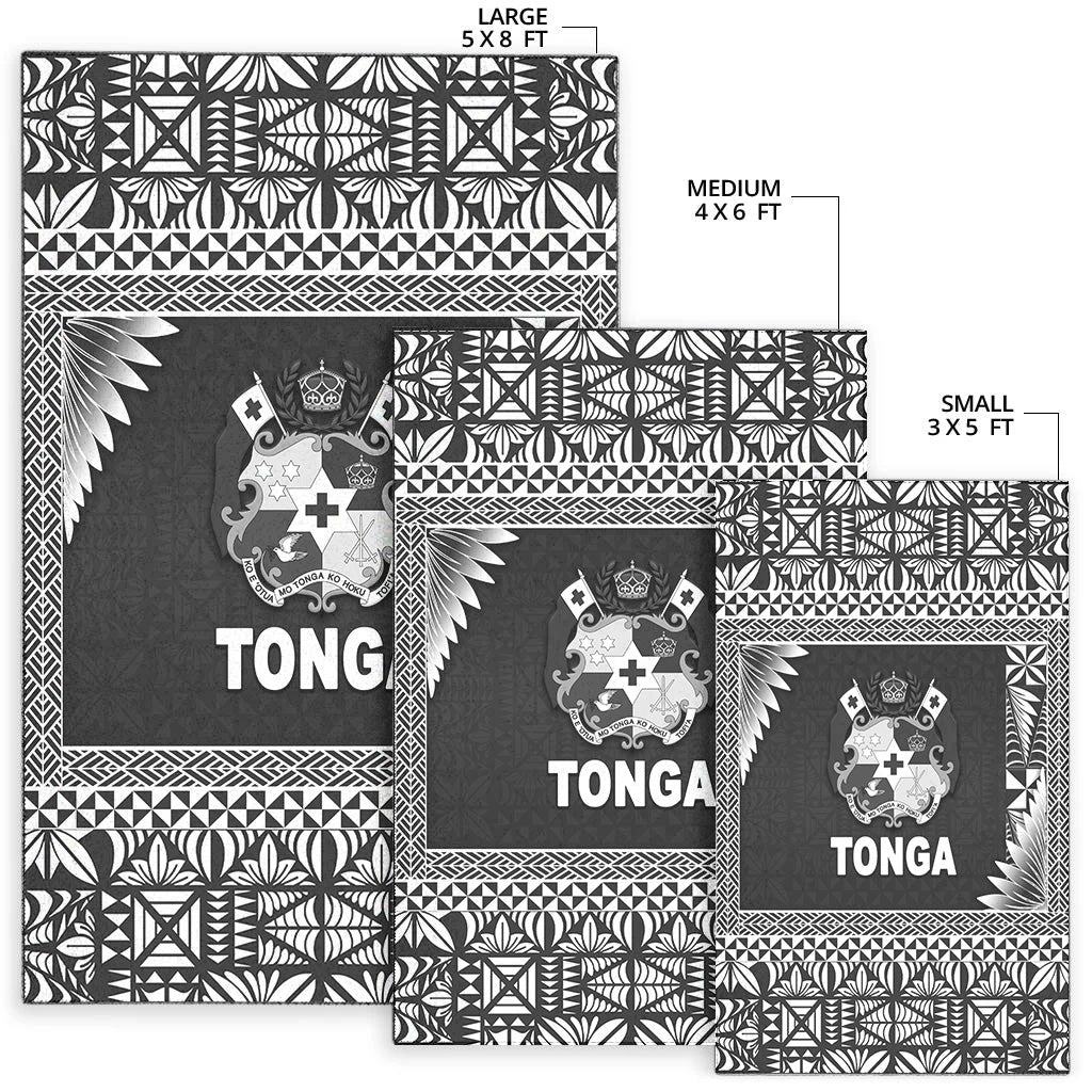 Set of black Tonga rugs in large, medium and small sizes, crest logos and borders