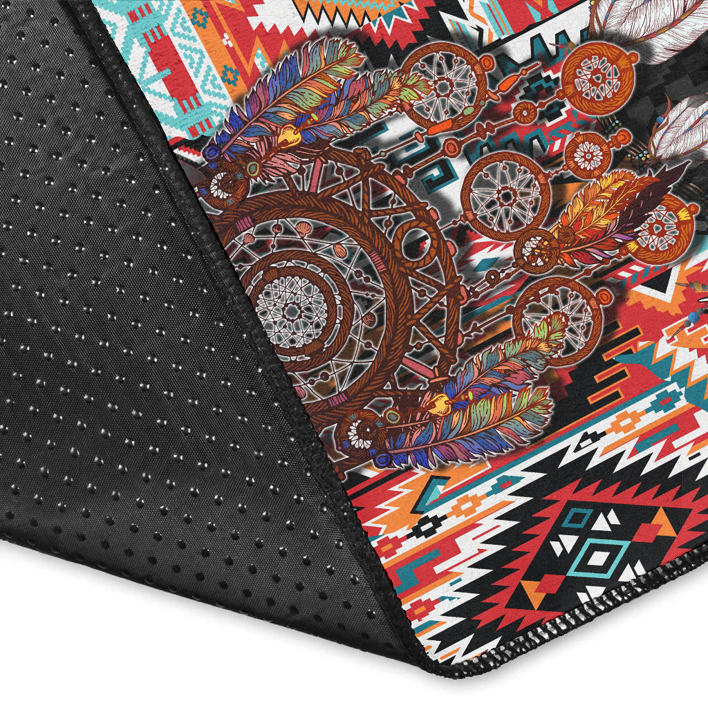 Corner close-up of black Native dreamcatcher rug with dotted texture and colorful pattern
