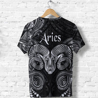 Black short-sleeve T-shirt featuring Aries text over stylized ram face with tribal patterns