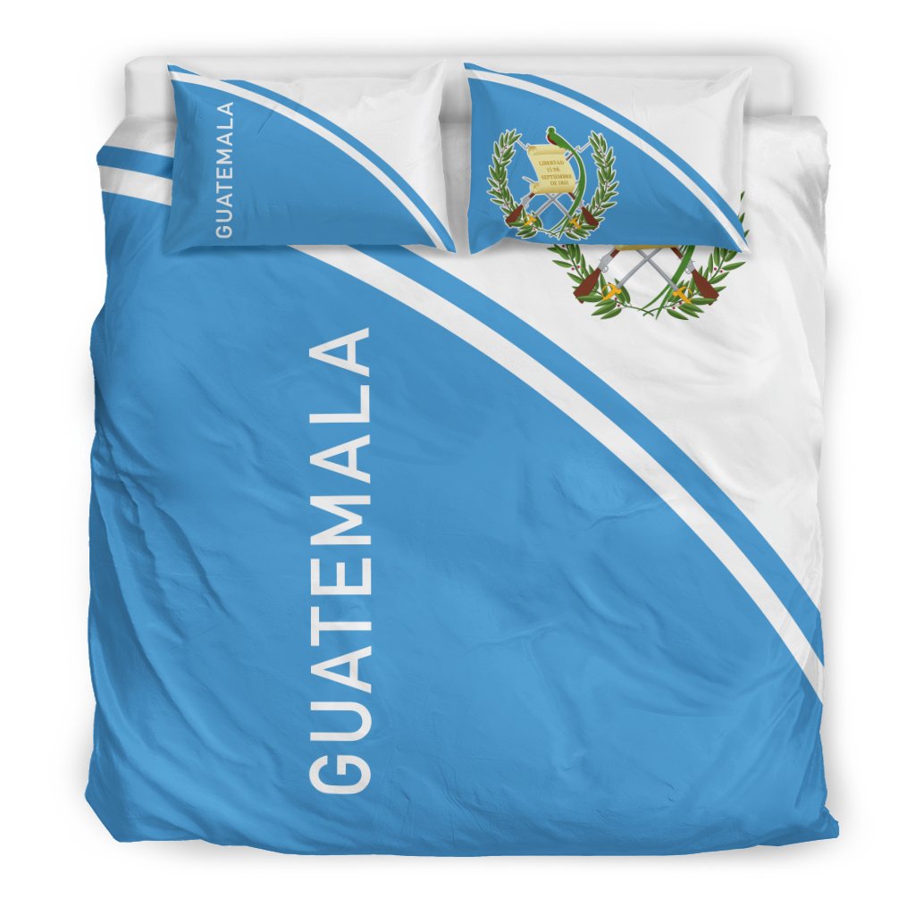 Guatemala bedding set with blue duvet, white diagonal stripes, matching pillowcases
