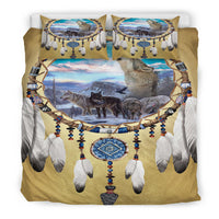 Front-facing bedding set: wolf pack artwork and dreamcatcher motif on gold comforter, 2 pillows