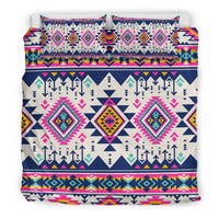 Front view of multicolor Native geometric bedding set with two matching pillow shams, pink