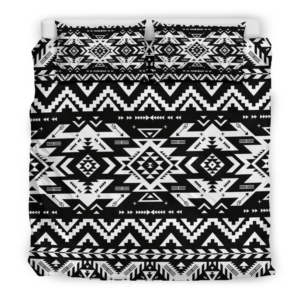 Flat view of black and white Native American style bedding set with bold geometric motif