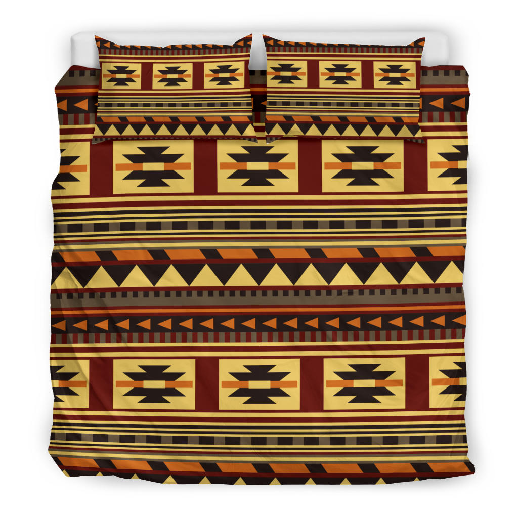 Coordinated bedding set featuring multicolor tribal style stripes and central emblem panels