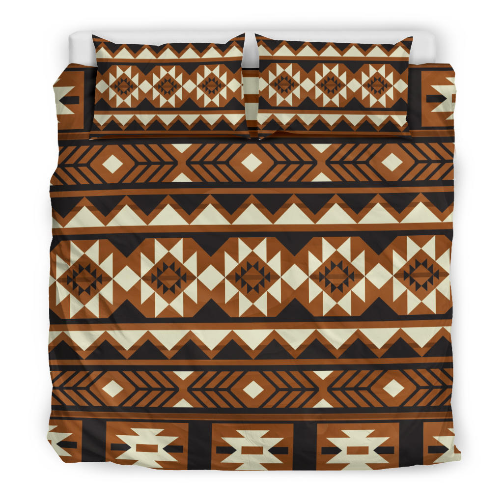 Brown tribal bedding set with repeating diamond pattern and two coordinated pillows