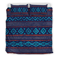 Native American bedding set flat view: geometric chevrons and diamonds in teal/navy