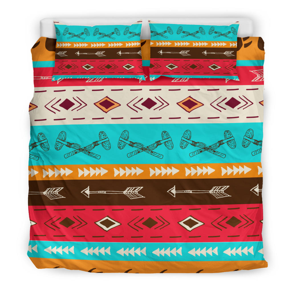 Turquoise, red, and brown duvet cover with diamond motifs, arrows, and decorative stripes