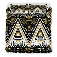 Tribal bedding set front view with two pillows, bold geometric triangles and arrows