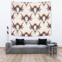 Bison skull tapestry wall hanging with repeated multicolor skulls and tribal diamond motifs