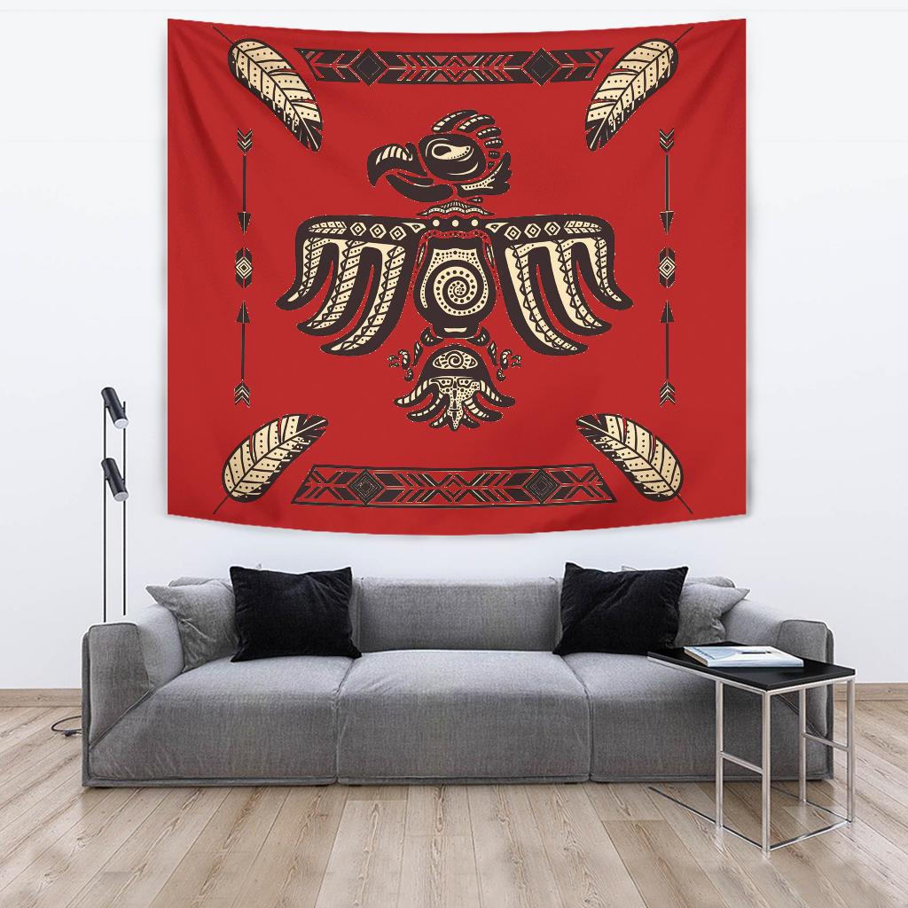 Red tribal wall tapestry with feather-wing design and central figure textile