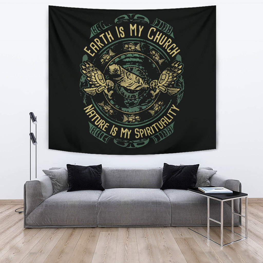 Black tapestry with round emblem, wing motifs, and scripture-style text around the border