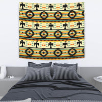 Tribal tapestry wall hanging with multicolor zigzags, diamonds, and starbursts