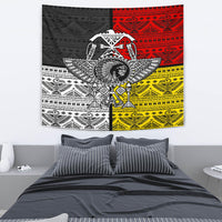 Native arrow tapestry showing a warrior chief in the center with black-white-red-yellow motifs