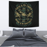 Black tapestry with central circular emblem, wing motifs, and 'Earth is My Church'