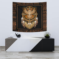 Dreamcatcher tapestry: golden owl with beaded face and hanging feather strands on black