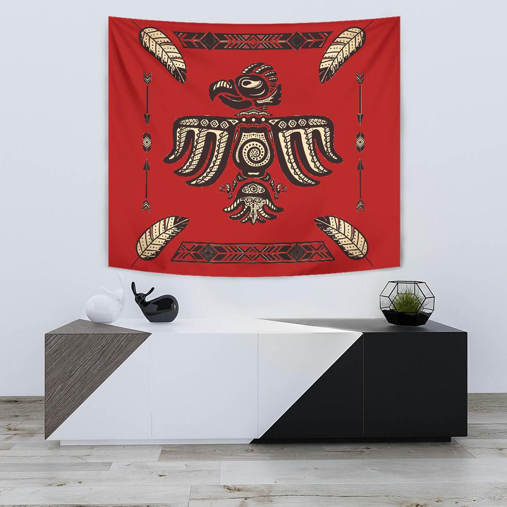 Red tapestry with tribal bird and feather motifs, colorful central figure
