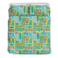 Multicolor tiki pattern duvet cover and pillows with Greek key borders and tropical icons