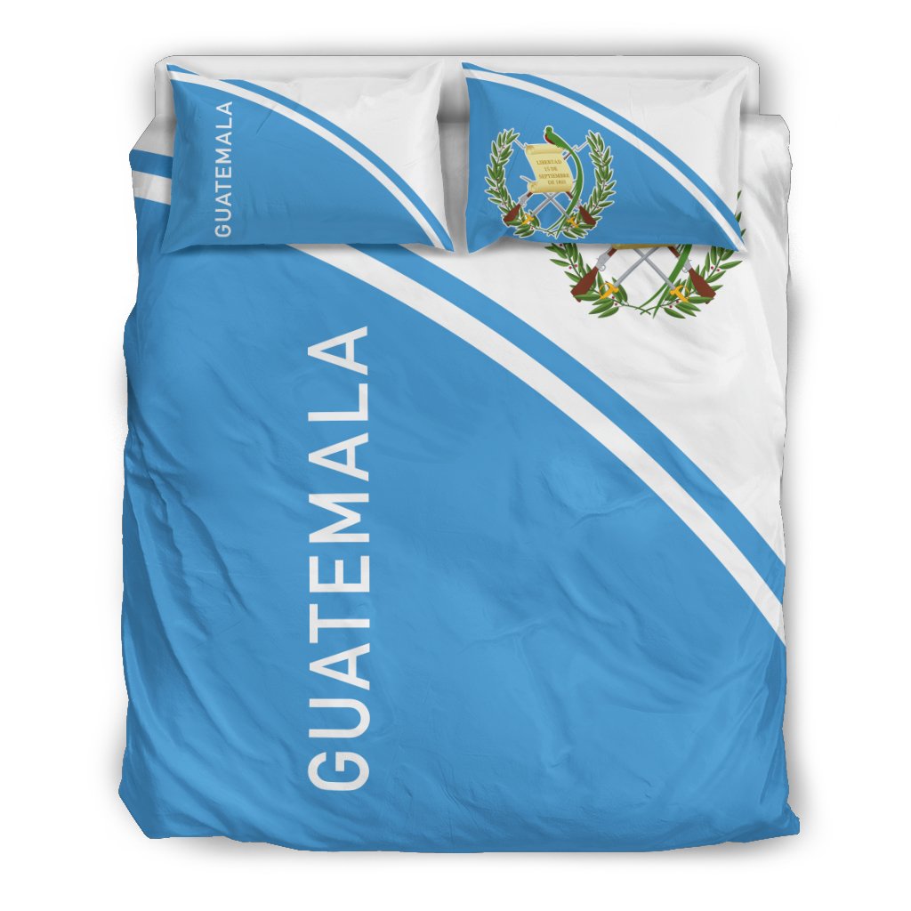 Guatemala bedding set, blue duvet and white stripes, crest logo on pillow