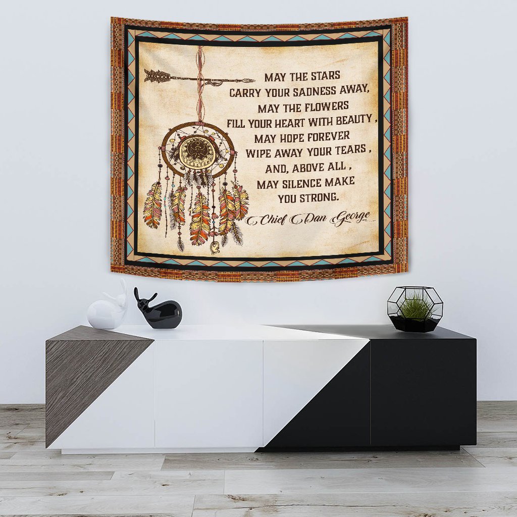 Native American tapestry with large dreamcatcher circle, multicolor feathers, and quote