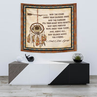 Native American tapestry with large dreamcatcher circle, multicolor feathers, and quote