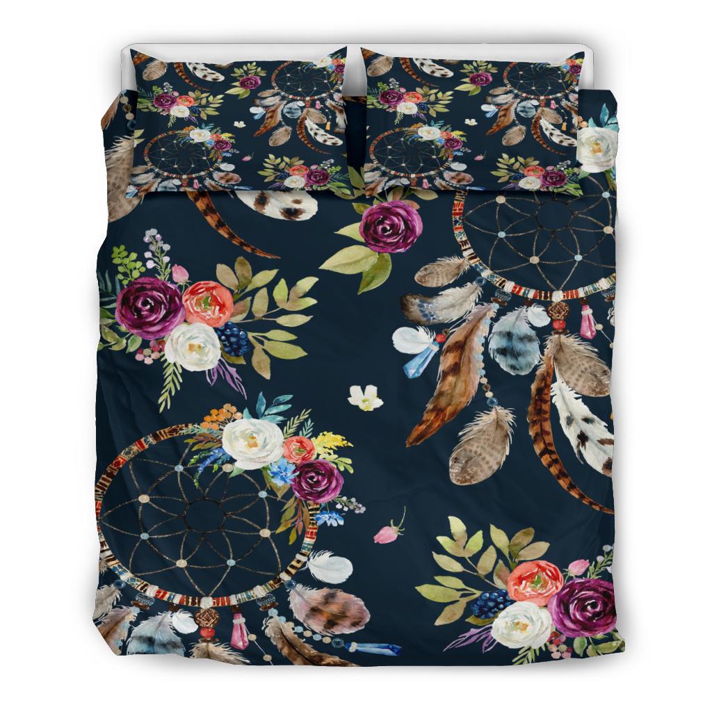 Front view bedding set: navy duvet with dreamcatcher hoops, roses, and feather print