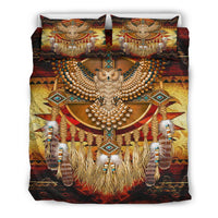 Front view multicolor owl dreamcatcher bedding with two pillows; large owl face and feather fringe