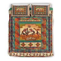 Bedding set with central Kokopelli scene quilt and matching pillow shams