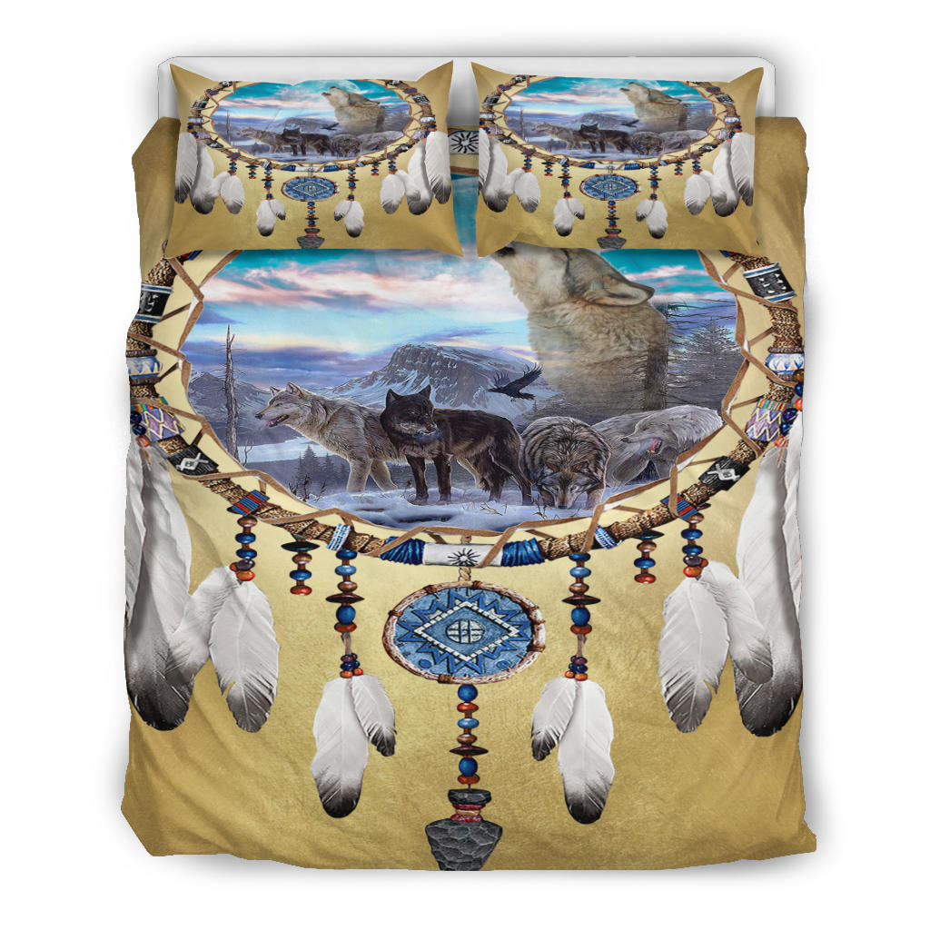 Centered bedding set view: gold comforter with wolf pack scene, dreamcatcher circle, 2 pillows