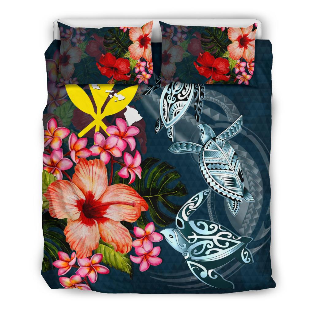 Dark teal bedding set with turtle, plumeria and hibiscus florals; two pillowcases