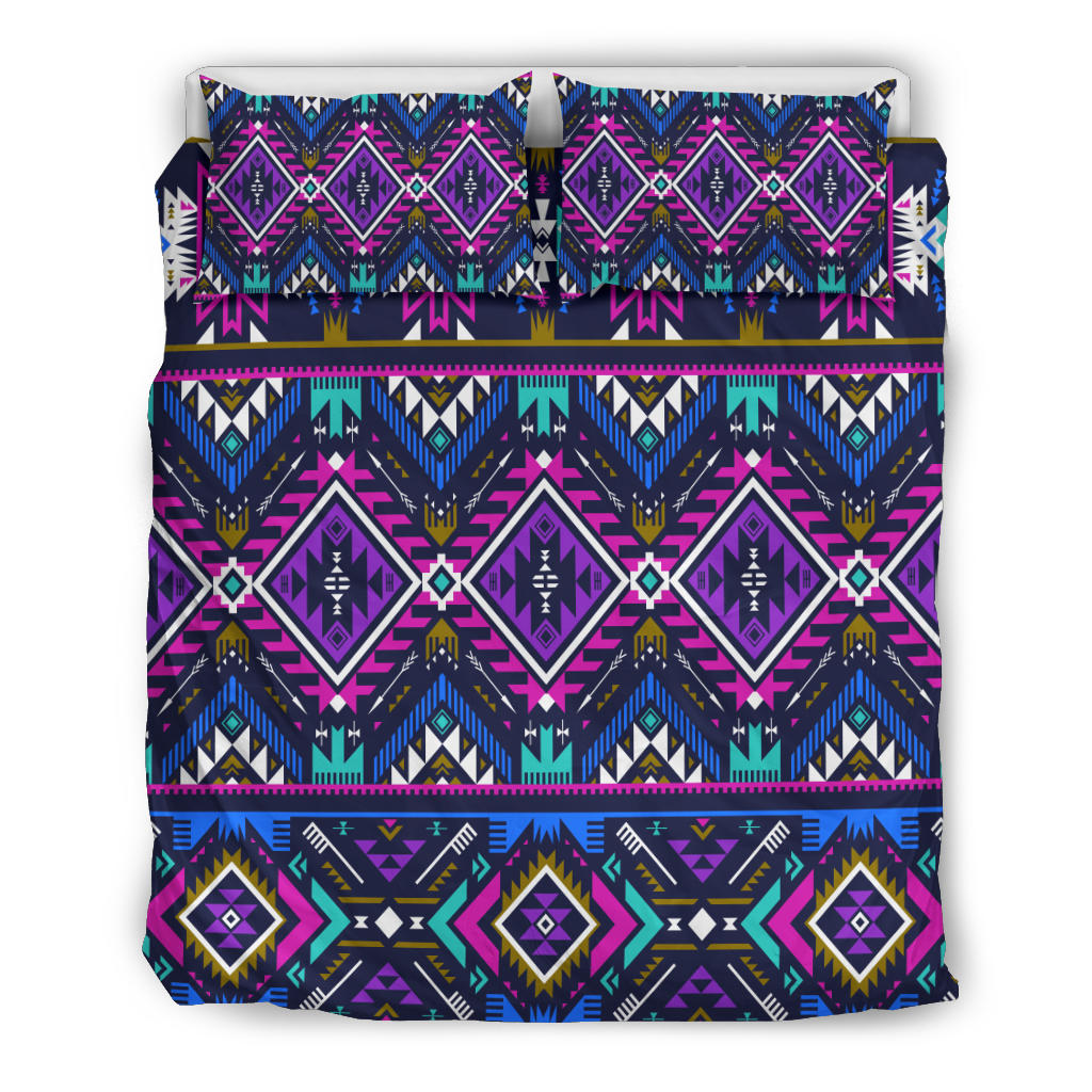 Bedding set flat-lay, purple-blue tribal geometric pattern on comforter and pillowcases