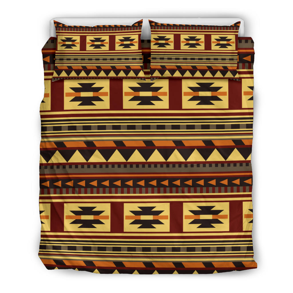 Multicolor bedding set view with matching pillow shams and bold geometric design