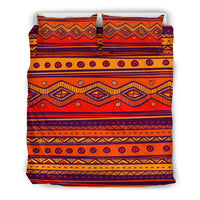 Orange duvet bedding set with repeating circles, diamonds, and horizontal stripe motifs