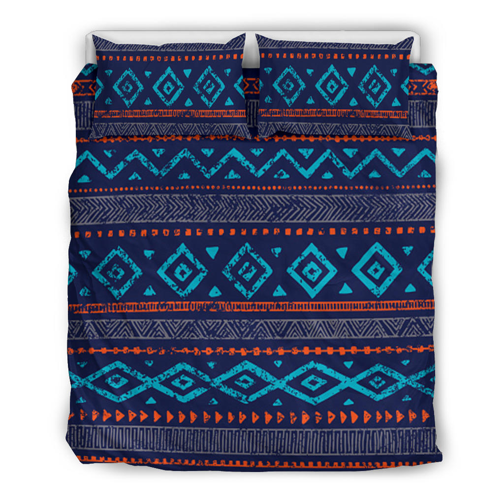 Bedding set with pillows: teal and navy diamond motifs plus orange border lines