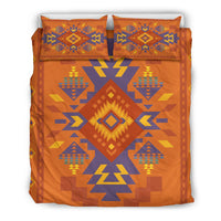 Multicolor geometric bedding set with two orange pillow shams featuring diamond and arrow motifs