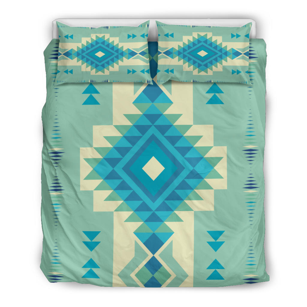 Teal bedding set featuring symmetrical Native-style geometric pattern with diamond center