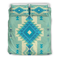 Teal bedding set featuring symmetrical Native-style geometric pattern with diamond center