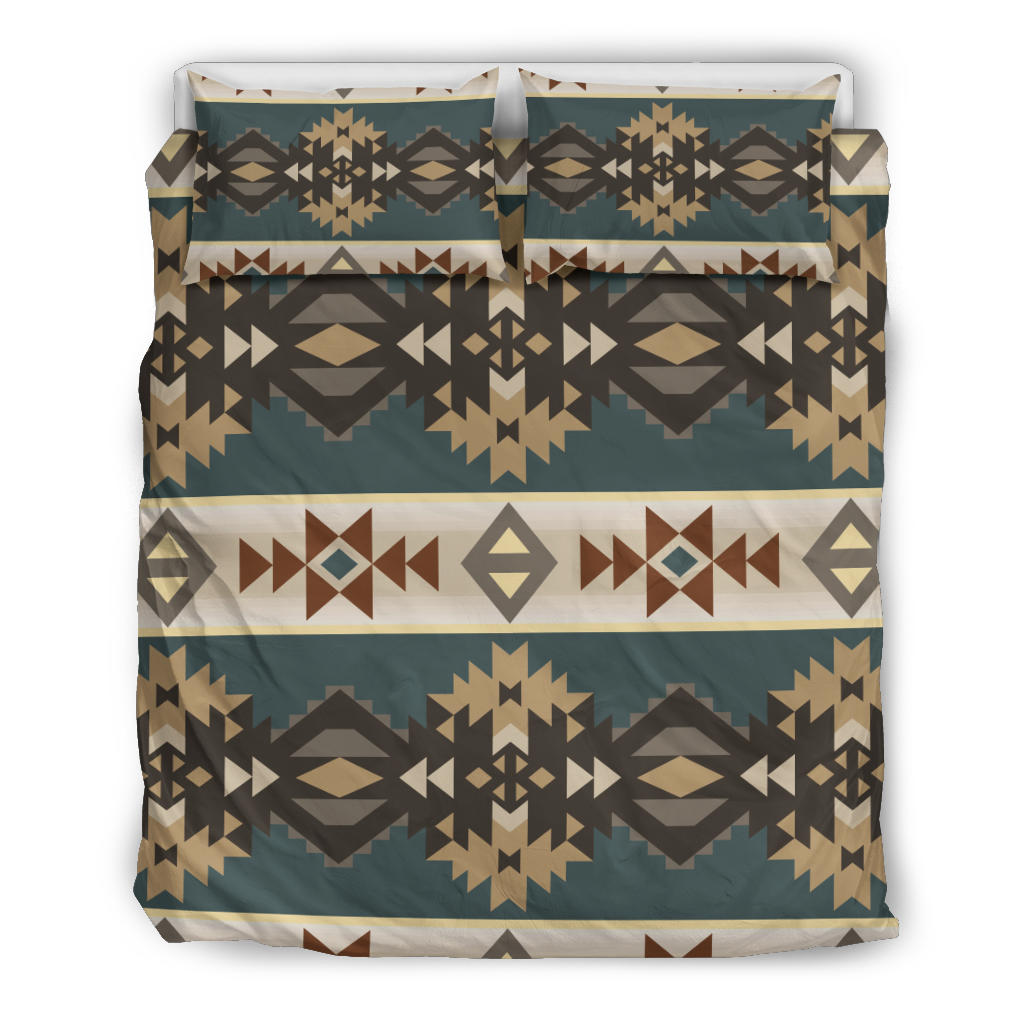 Bed set top view: teal base with repeating geometric arrows, diamonds, and stars.