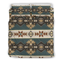 Bed set top view: teal base with repeating geometric arrows, diamonds, and stars.