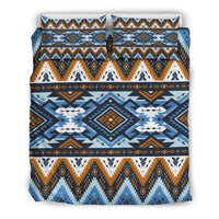Front view of tribal patterned bedding set with two pillow shams in blue, orange, and white