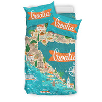 Croatia bedding set with two pillows: teal map design, orange ribbons, compass rose