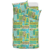 Multicolor tiki patterned bedding set with geometric blocks and surf motifs, with two pillows